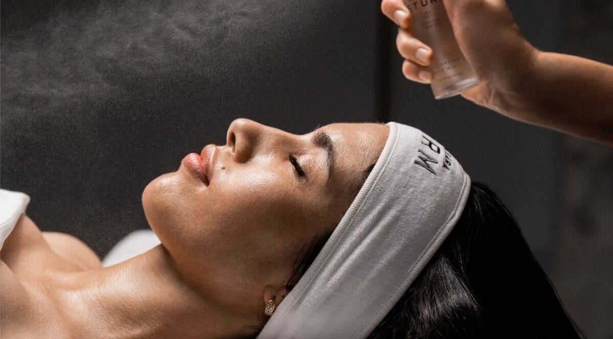 Facial misting treatment at The Skin Spot, Cape Town, Western Cape, ZA. Relaxing spa experience depicted.