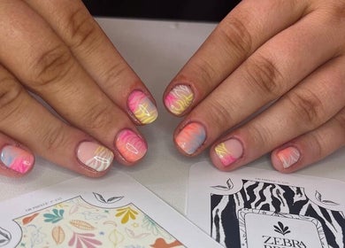 Colorful wave nail art at Kayley Diane Nails, Colchester, England, GB. Perfect manicure showcasing vibrant designs.