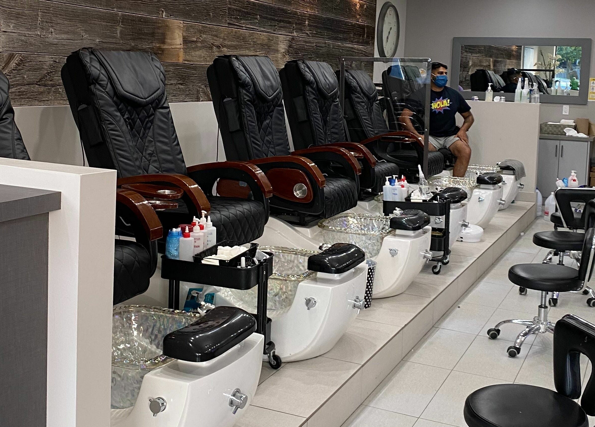 Elegant pedicure chairs at The Nail Chamber, Markham, Ontario, CA, offering ultimate comfort and relaxation.