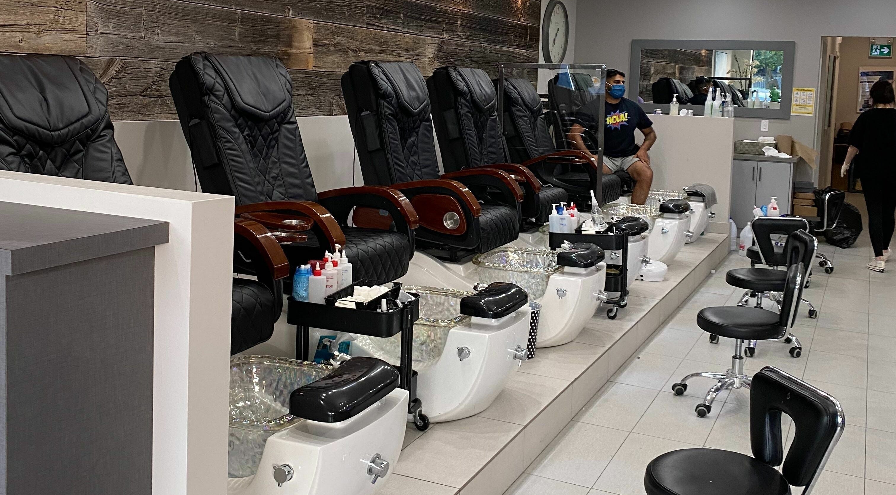 Elegant pedicure chairs at The Nail Chamber, Markham, Ontario, CA, offering ultimate comfort and relaxation.