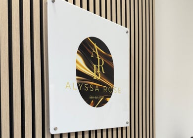 Sleek Alyssa Rose Beauty sign on wooden panel, Darwen, England, GB.