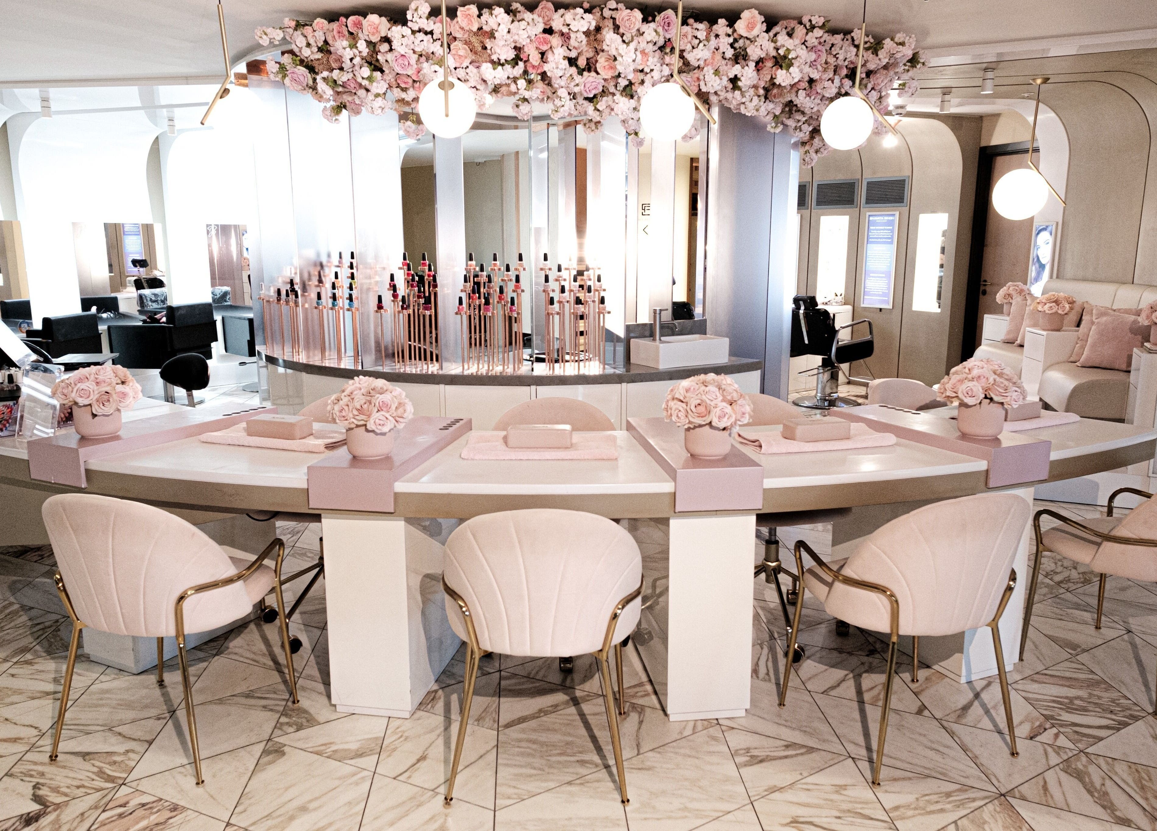 Chic interior of Nail'd It Birmingham with floral decor in Birmingham, England, GB.