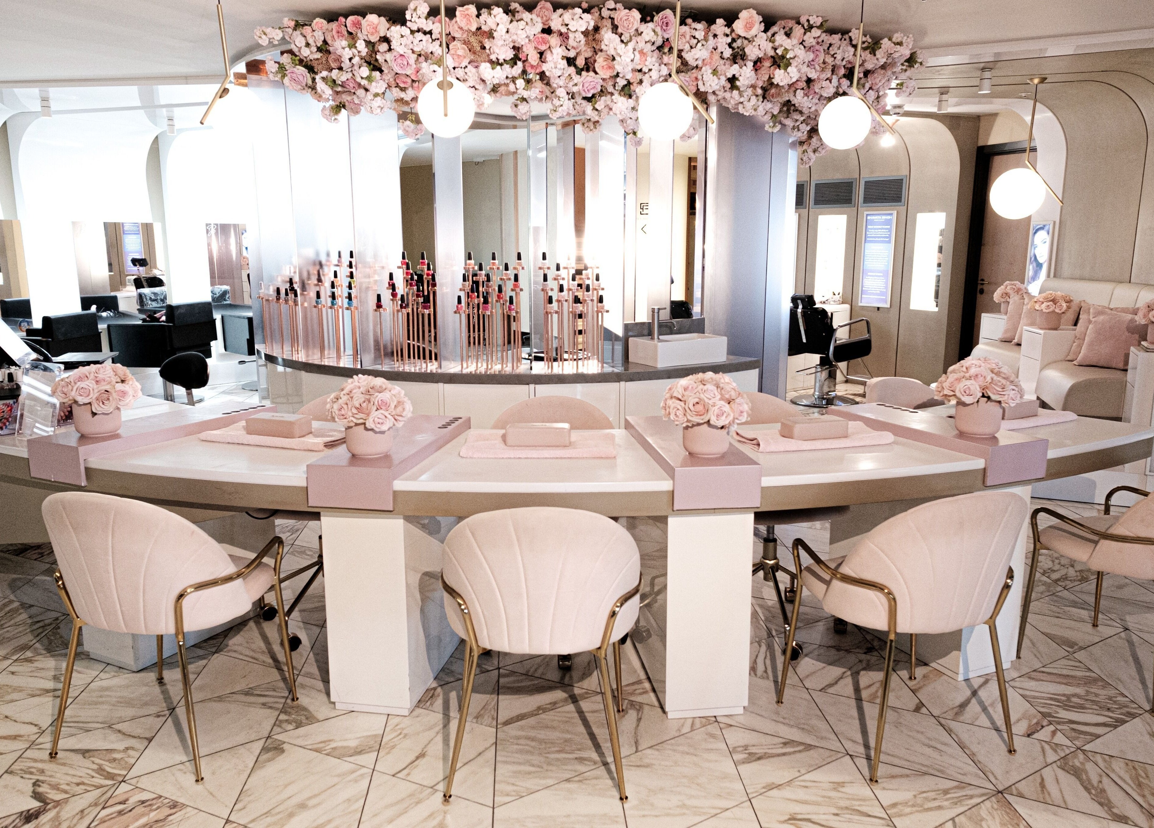 Chic interior of Nail'd It Birmingham with floral decor in Birmingham, England, GB.