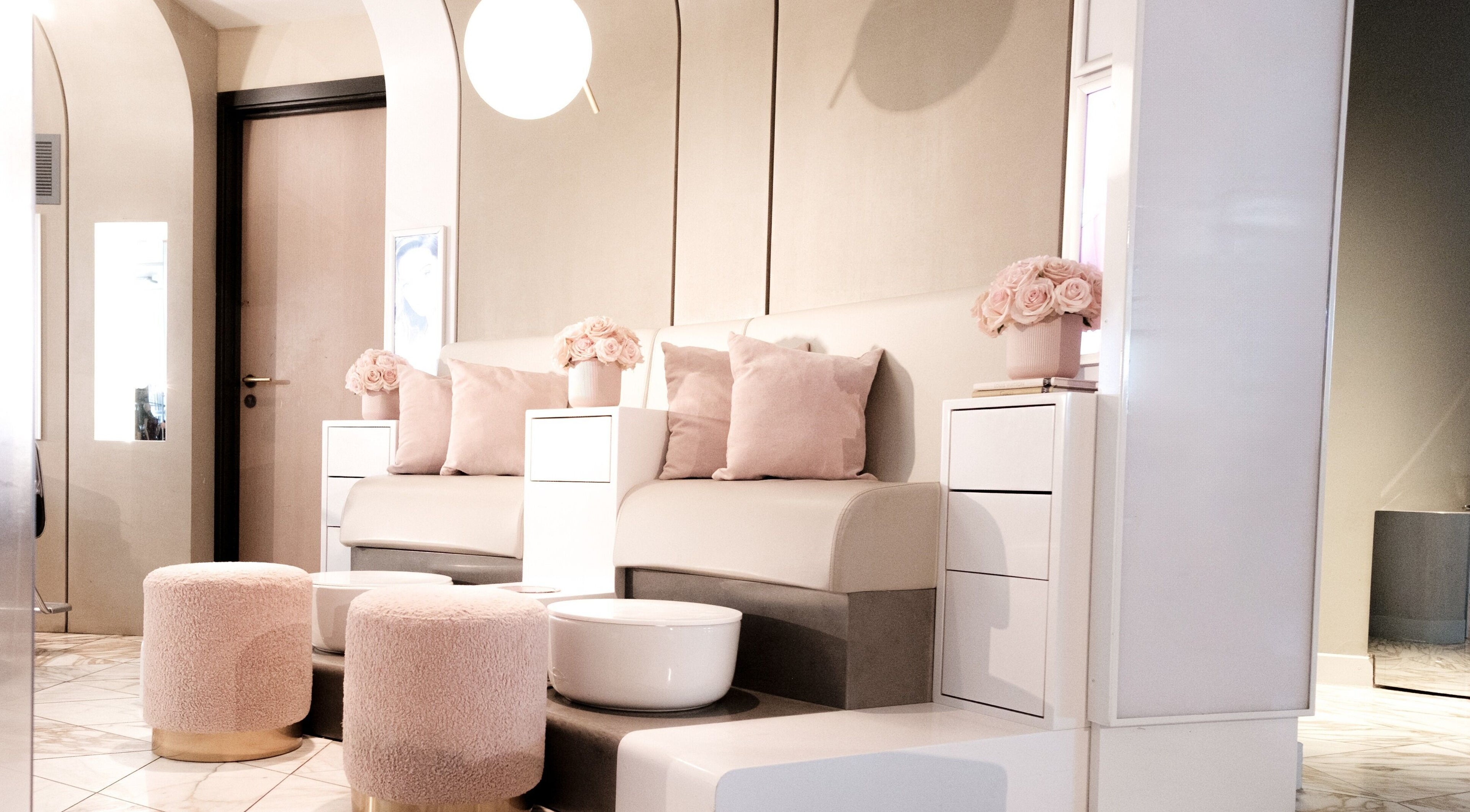 Elegant seating area at Nail'd It Birmingham, Birmingham, England, GB showcasing luxury decor.