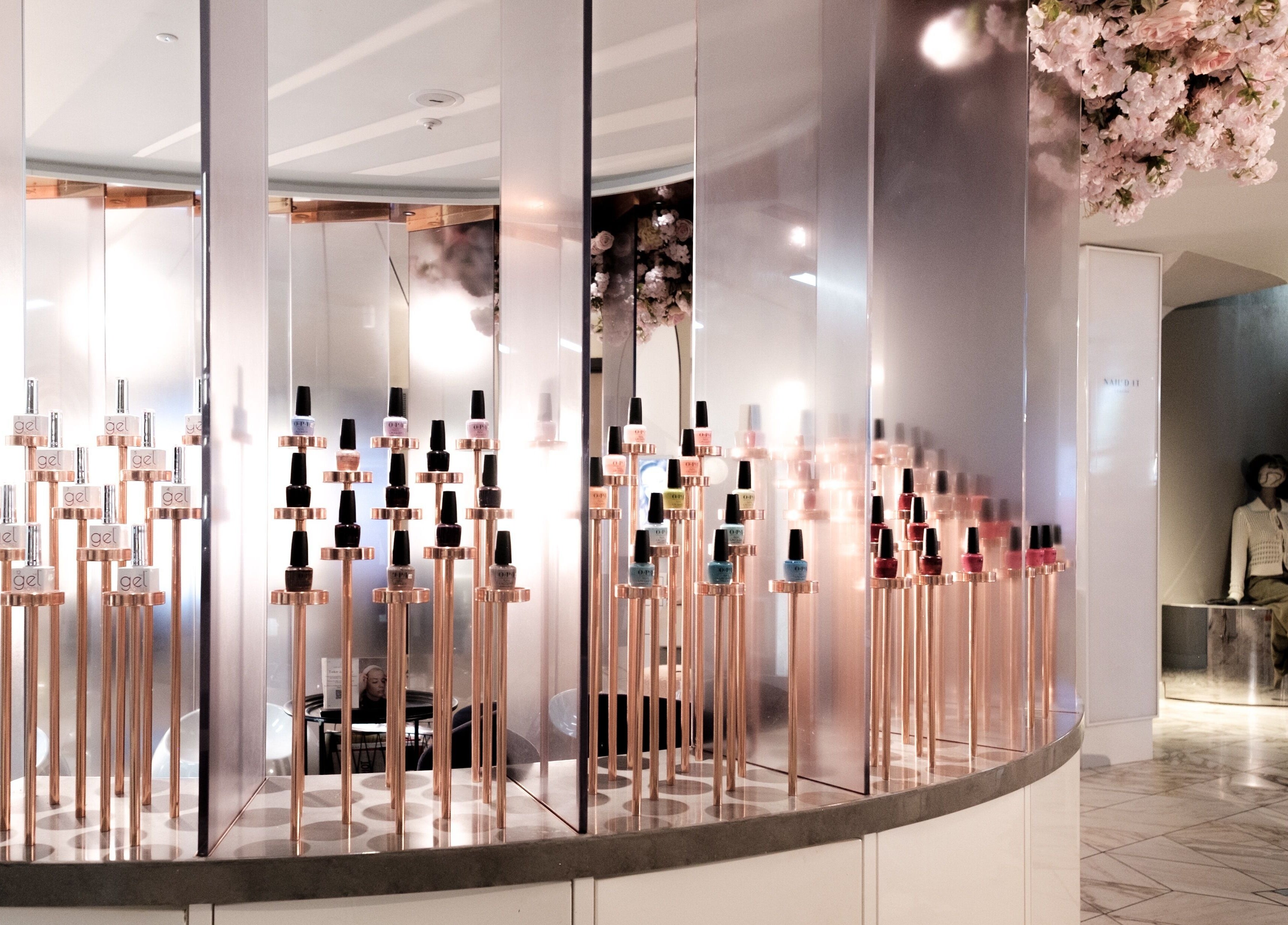 Stylish nail polish display at Nail'd It Birmingham, Birmingham, England, GB with chic decor.