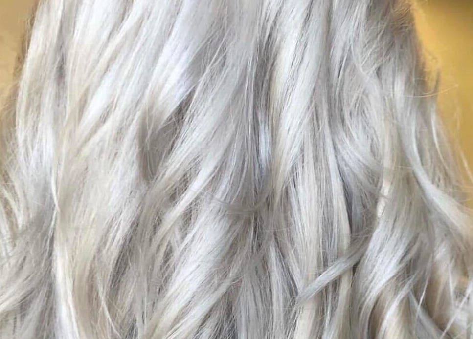 Elegant silver hair styled at Hair By Lorna Oldroyd, Ossett, England, GB, showcasing expert coloring.