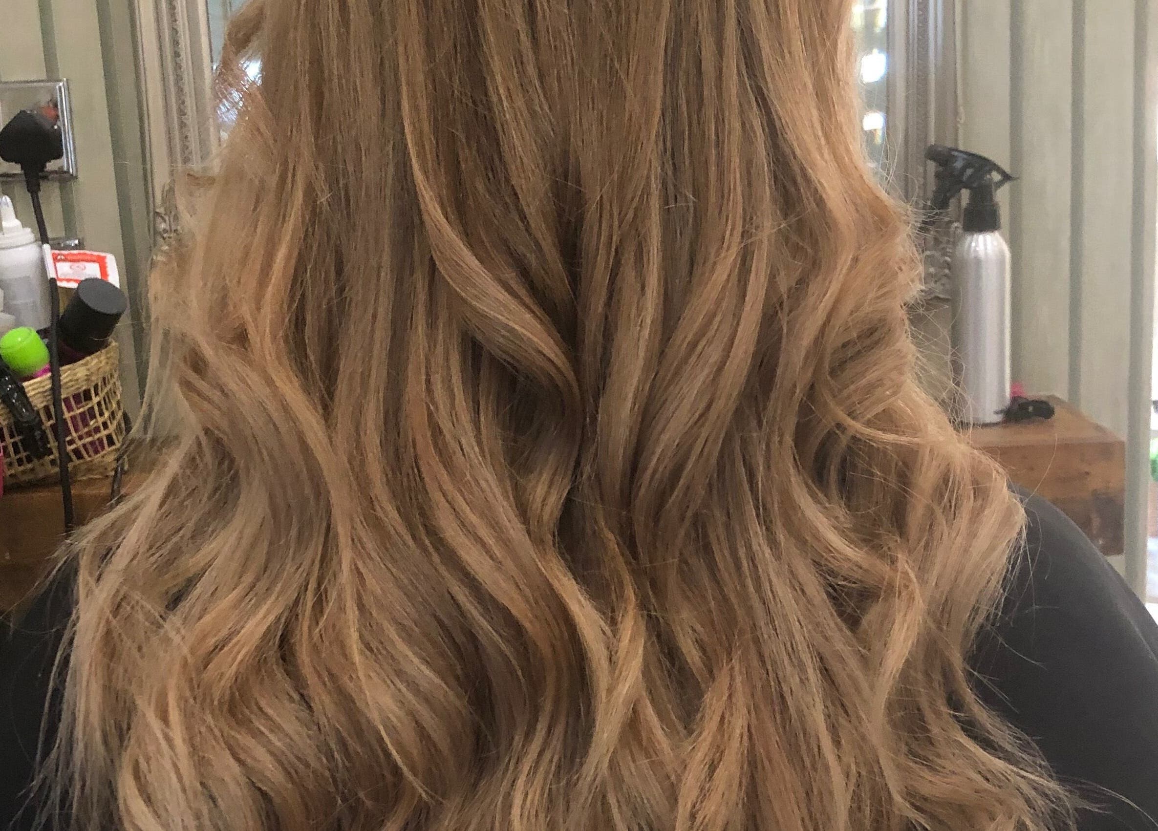 Blonde wavy hairstyle at Hair By Lorna Oldroyd in Ossett, England, GB salon.