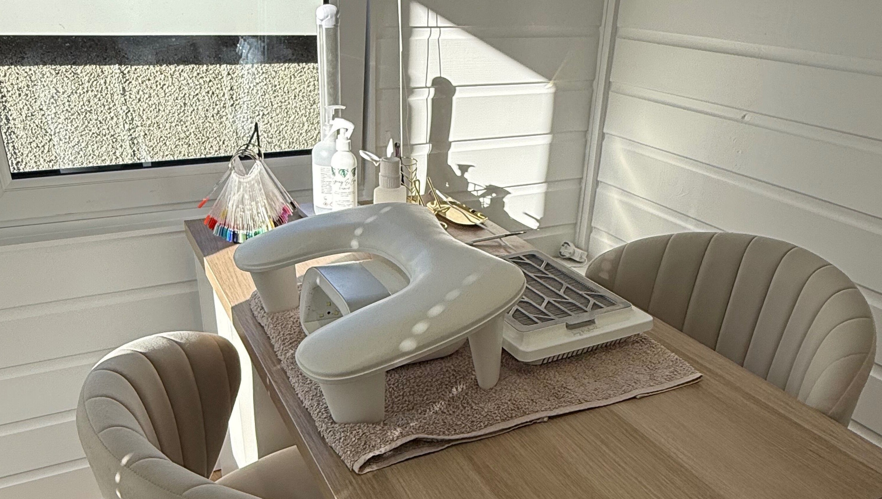 Cozy nail station at Nails by Rachel, Aberdeen, Scotland, GB featuring manicure tools and comfortable seating.