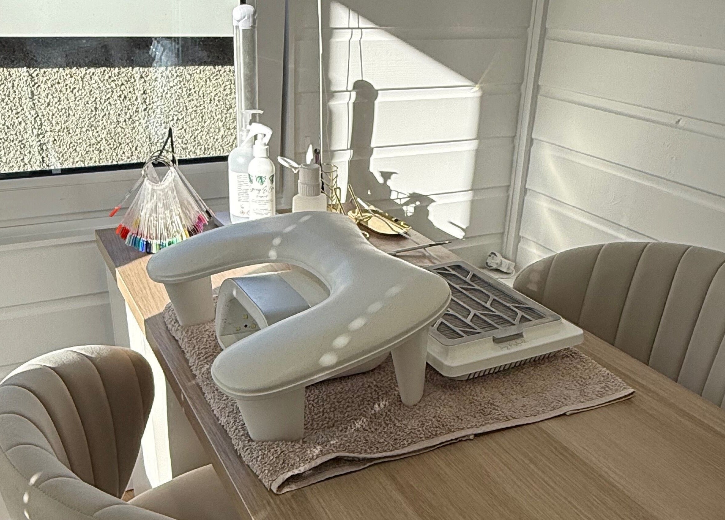 Cozy nail station at Nails by Rachel, Aberdeen, Scotland, GB featuring manicure tools and comfortable seating.