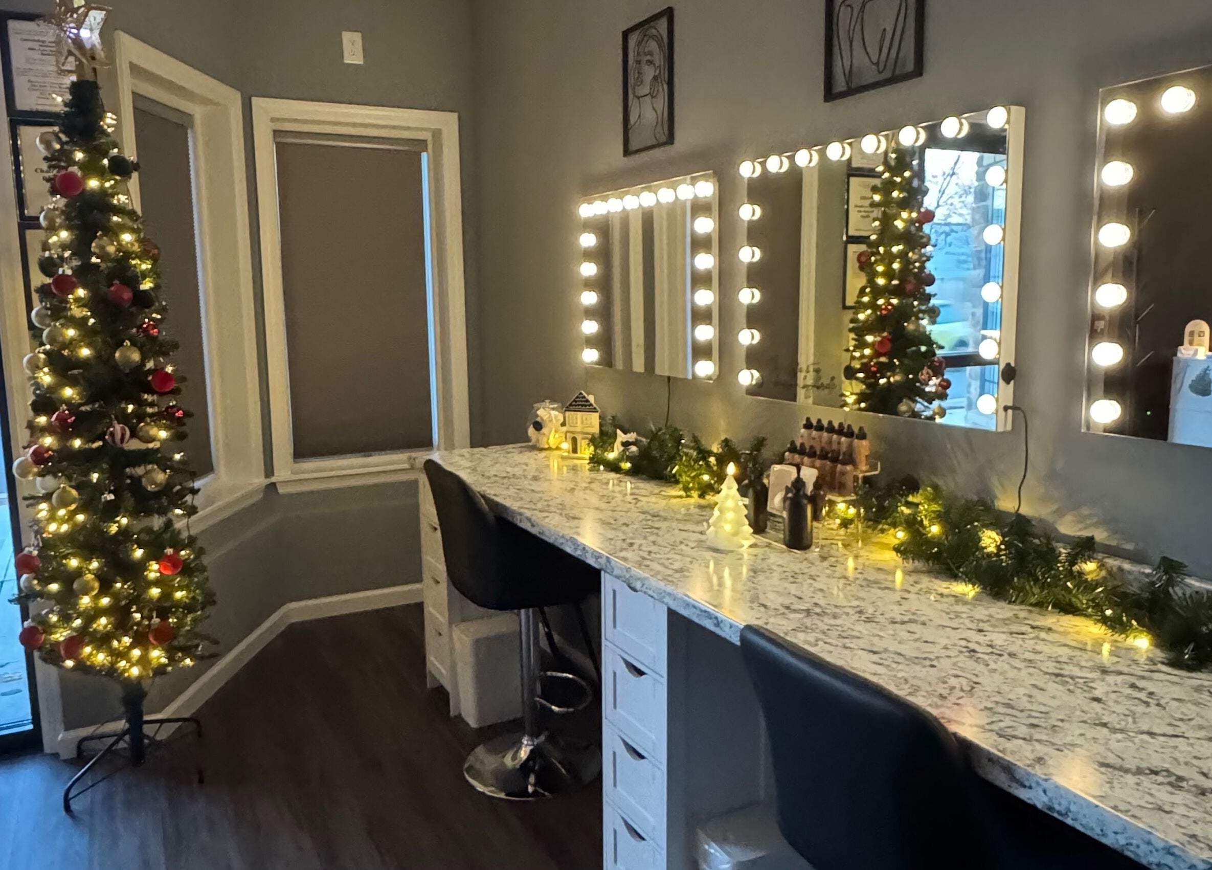 Makeup & Skin by Gabrielle in Middlesex, NJ, festive vanity with mirror lights and Christmas decor.