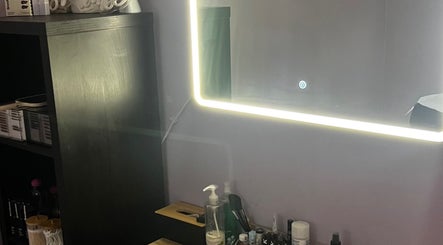 Elegant mirror with LED lighting at Pro Studio Bournemouth, beautifying space in Bournemouth, England, GB.