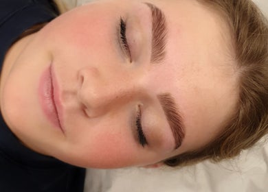 Relaxed client showcasing perfect brows at Pro Studio Bournemouth, Bournemouth, England, GB.
