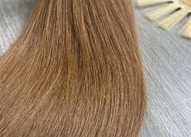 Luxurious brown hair extensions displayed at Pro Studio Bournemouth, Bournemouth, England, GB.