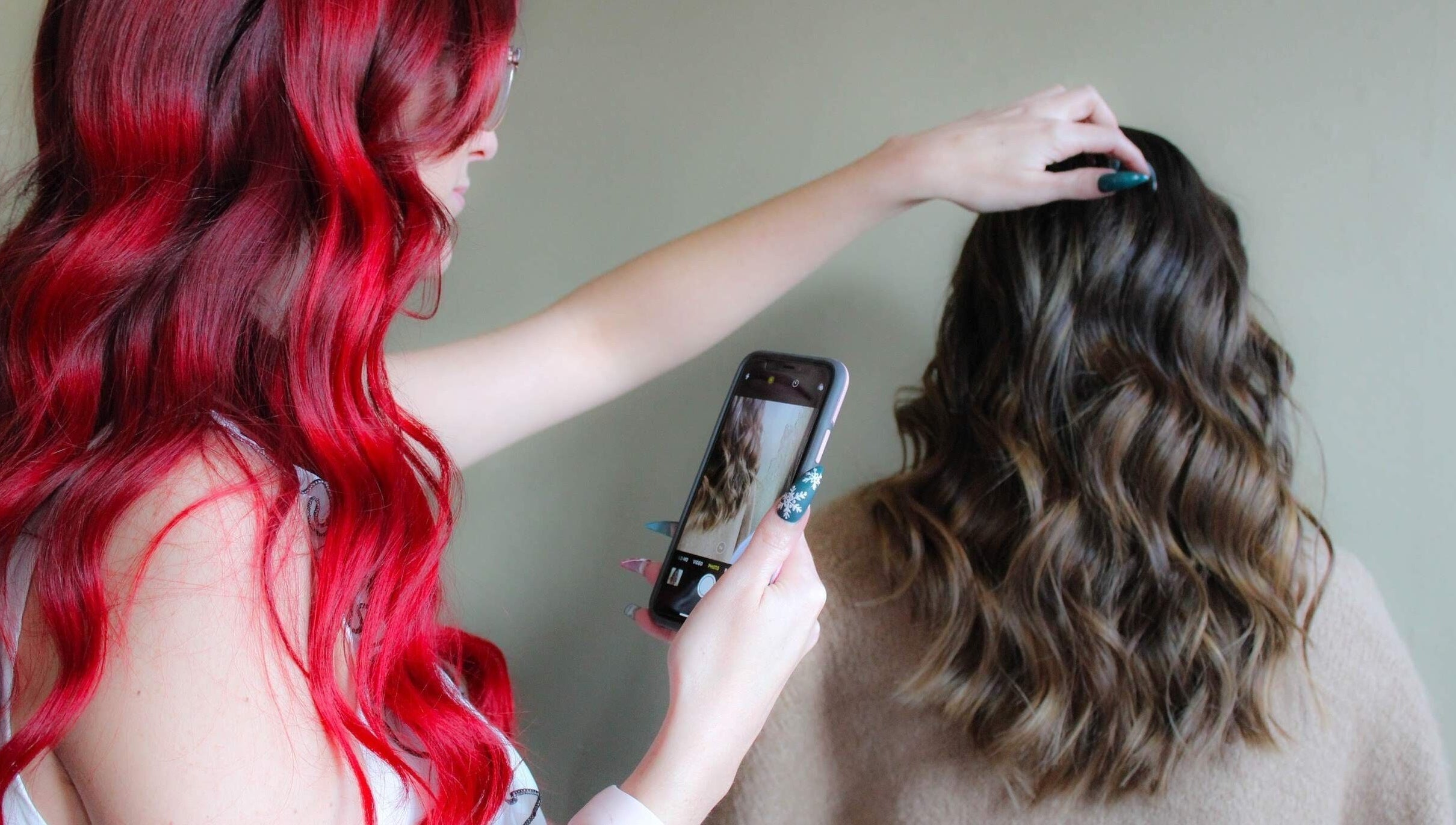 Hair stylist capturing styled hair at Modcrown Creations in Oshawa, Ontario, CA.