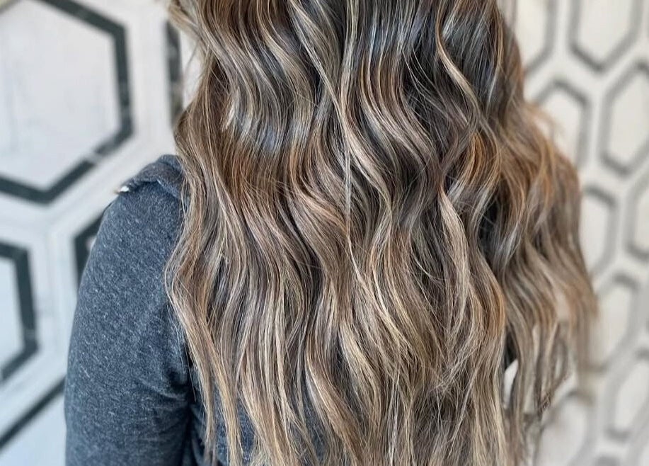 Stylish wavy hair highlighting expertise at Modcrown Creations, Oshawa, Ontario, CA salon.