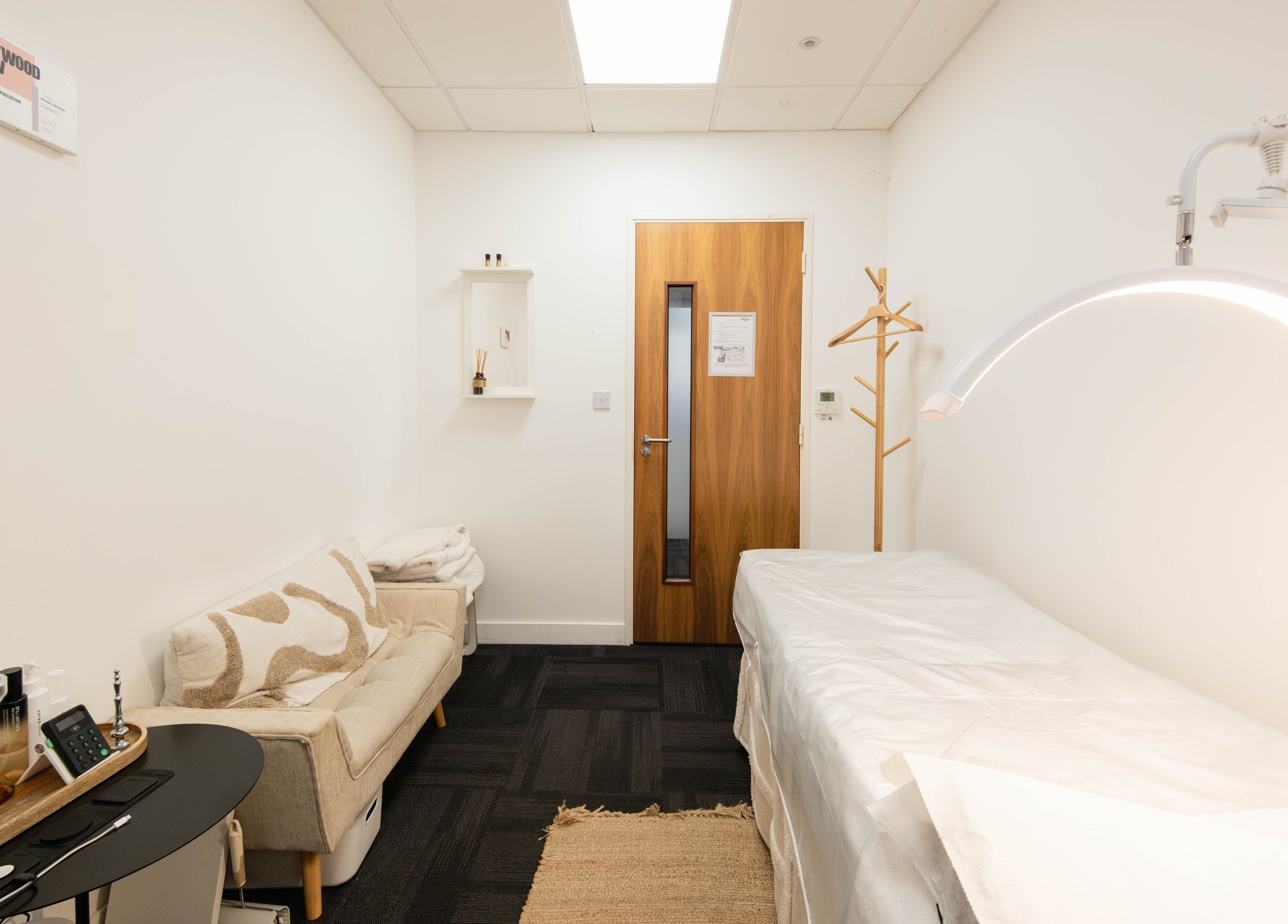 Tranquil therapy room at BIYU Lash Hanover Sq., London, England, GB, featuring a sleek massage table.