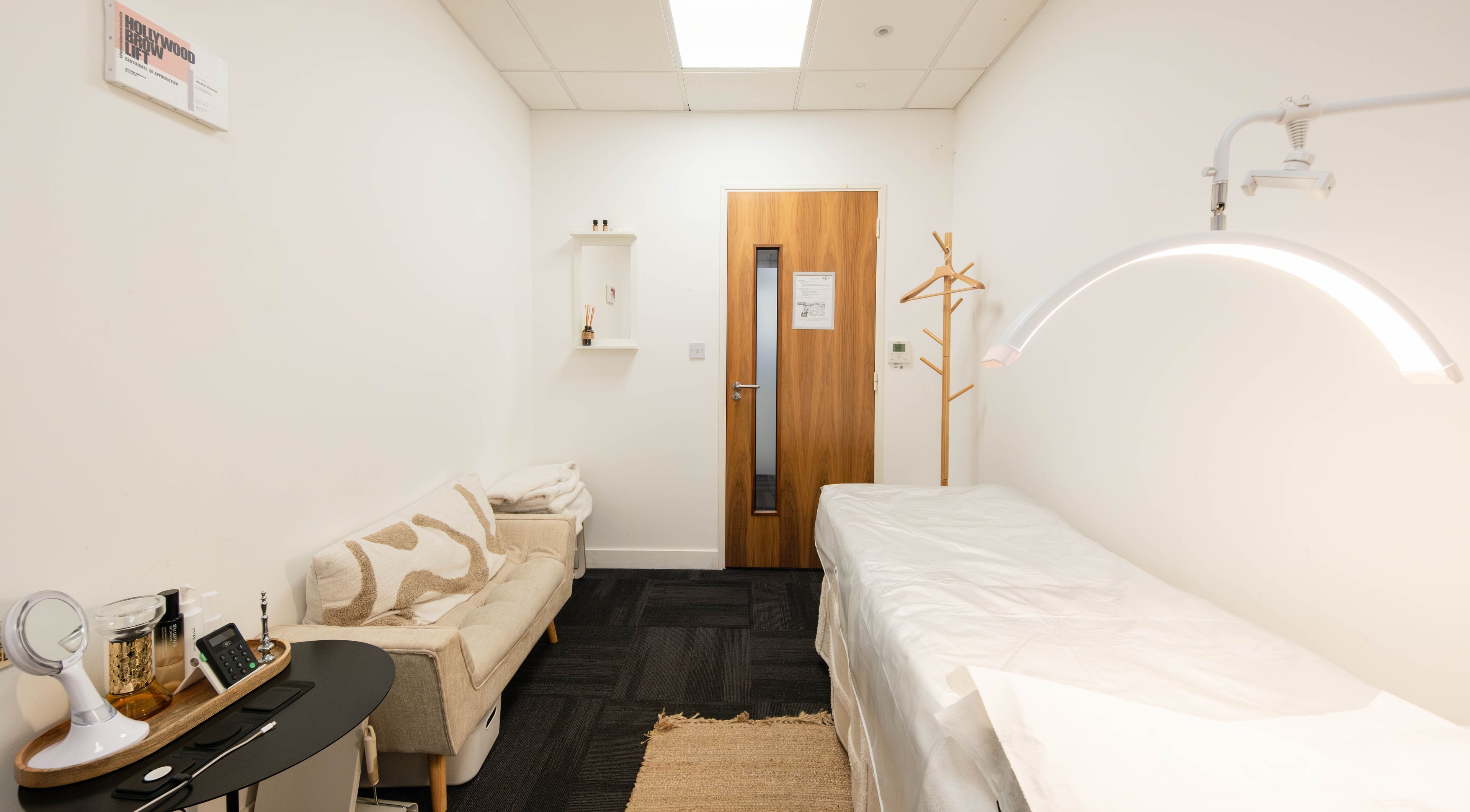 Tranquil therapy room at BIYU Lash Hanover Sq., London, England, GB, featuring a sleek massage table.