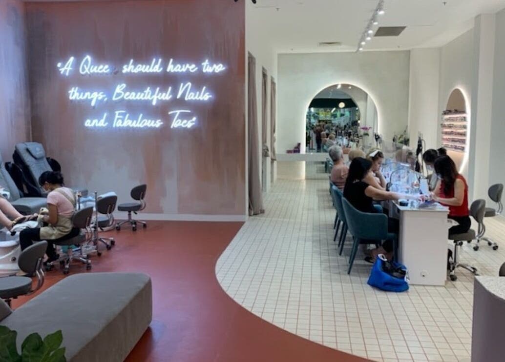 Interior of Queen Nails Spa & Beauty in Newton, South Australia, AU showcasing elegant nail stations and relaxing atmosphere.