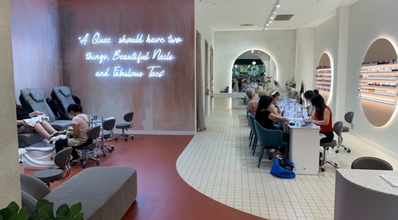 Interior of Queen Nails Spa & Beauty in Newton, South Australia, AU showcasing elegant nail stations and relaxing atmosphere.