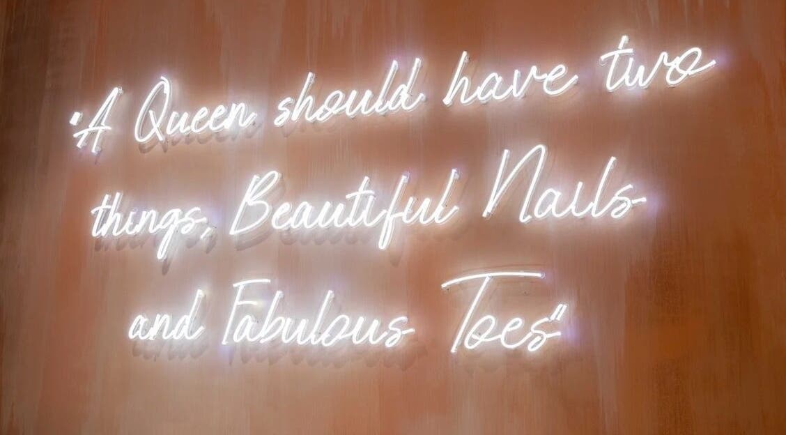 Illuminated quote at Queen Nails Spa & Beauty, Newton, South Australia, AU, inspiring confidence and elegance.
