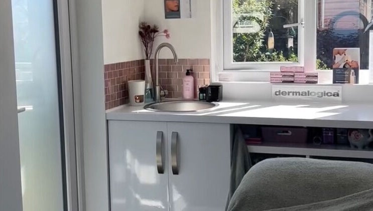 Glow House Beauty's sleek treatment room in Fareham, England, GB, featuring Dermalogica products.