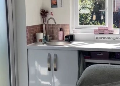 Glow House Beauty's sleek treatment room in Fareham, England, GB, featuring Dermalogica products.