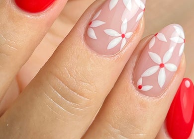 Red and floral nail art at Ella Nails Design, Alberton, Gauteng, ZA showcasing elegance and style.