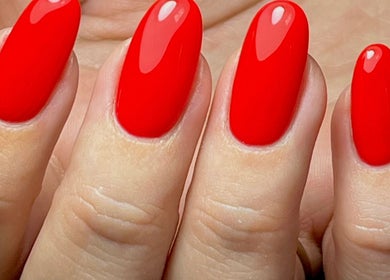 Stunning red manicured nails at Ella Nails Design in Alberton, Gauteng, ZA. Perfect for any occasion.