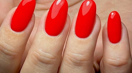 Stunning red manicured nails at Ella Nails Design in Alberton, Gauteng, ZA. Perfect for any occasion.