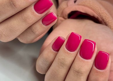 Vibrant pink manicure at Ella Nails Design, Alberton, Gauteng, ZA. Elegance in vivid color.
