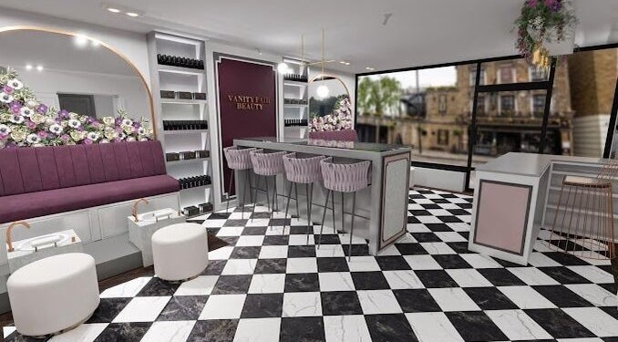 Elegant seating area at Vanity Fair Beauty and School, Royal Tunbridge Wells, England, GB with purple accents.