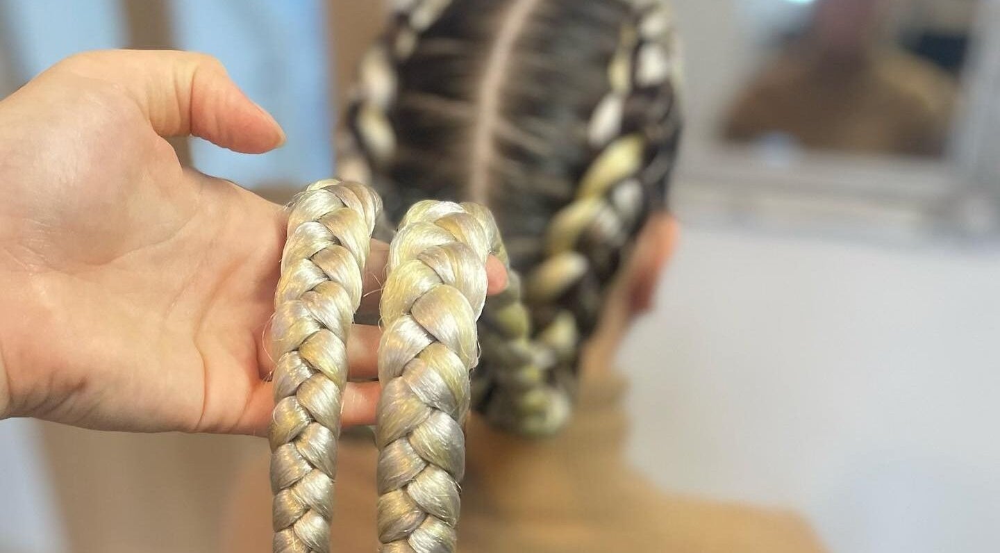 Intricate braids styled at CoCo Braids and Brows (Rugby), located in Rugby, England, GB. Perfect for stunning looks.