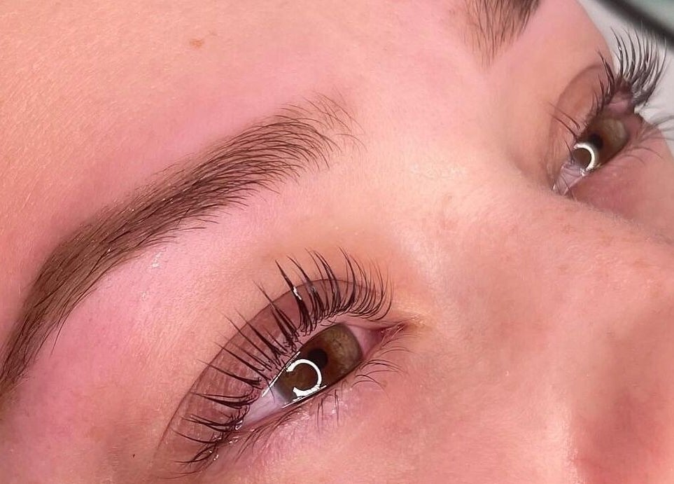 Close-up of expertly styled brows and lashes at CoCo Braids and Brows (Rugby), Rugby, England, GB.