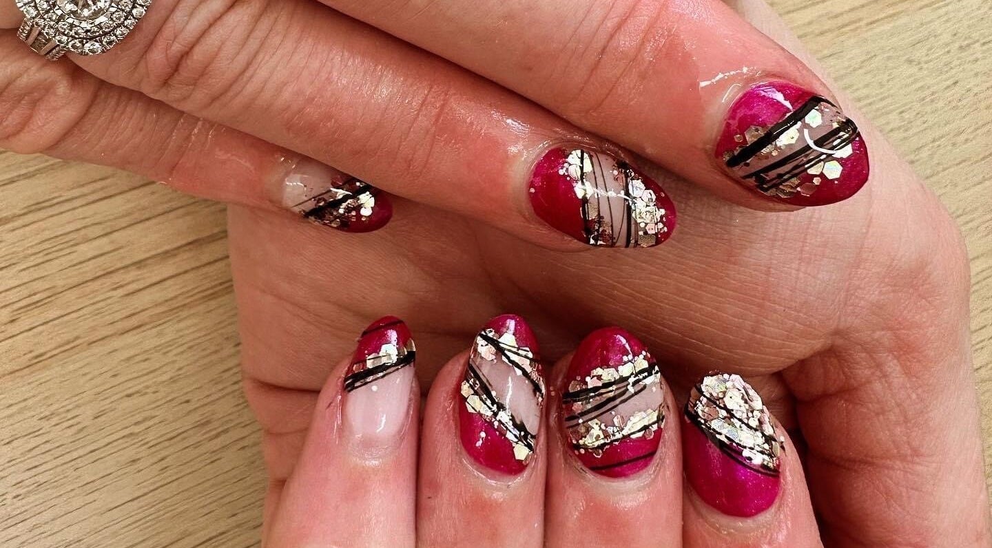 Stylish nail art featuring red and black designs at Polished by Makala, Mountain Creek, Queensland, AU.