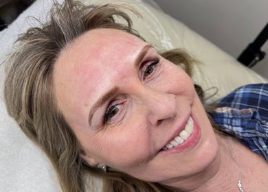 A happy customer enjoying a beauty treatment at Matthews in Matthews, North Carolina, US.