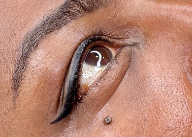 Close-up of a well-groomed eye at Matthews in Matthews, North Carolina, US, showcasing beauty services.