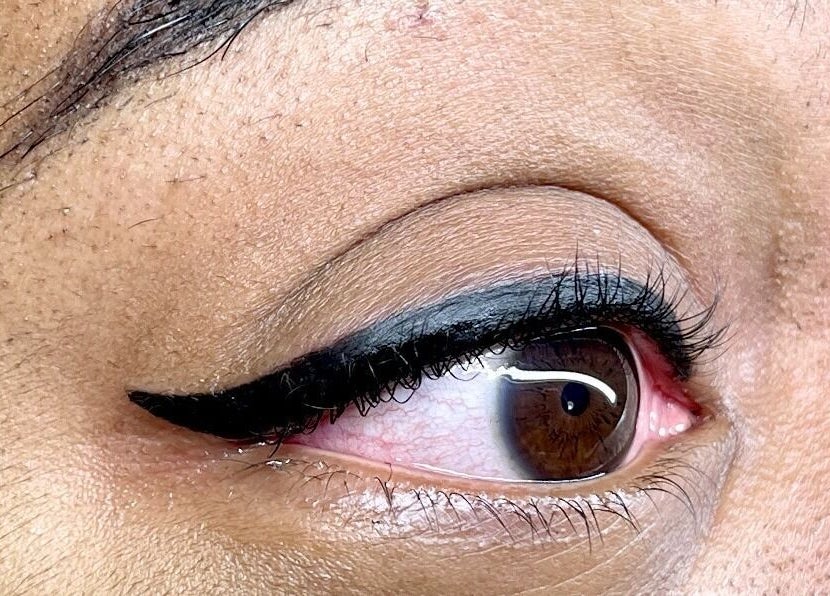 Close-up of expert eyeliner application at Beautiful You By Christine - Davidson, NC, enhancing natural beauty.
