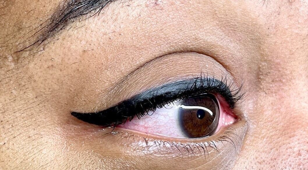 Close-up of expert eyeliner application at Beautiful You By Christine - Davidson, NC, enhancing natural beauty.