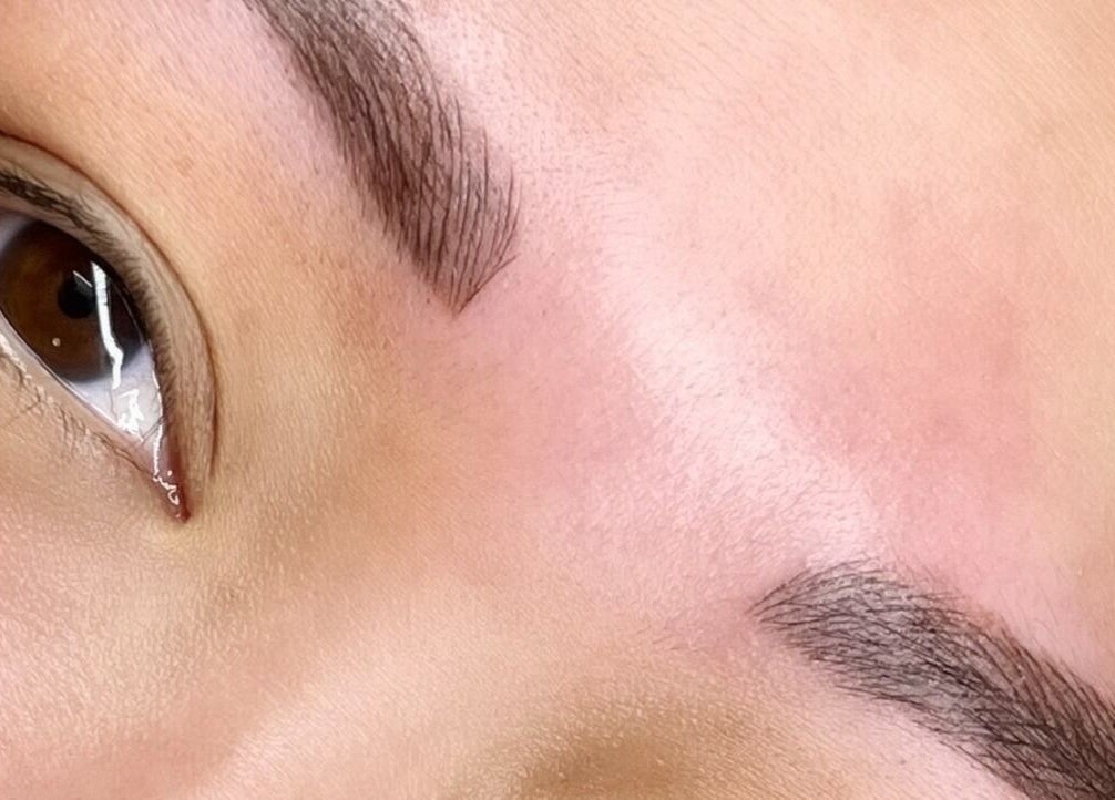 Close-up of perfectly shaped eyebrows at Beautiful You By Christine - Davidson, NC, enhancing natural beauty.