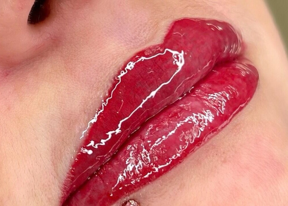 Glossy red lips beauty service at Beautiful You By Christine, Davidson, North Carolina, US.