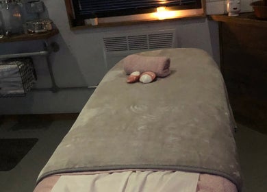Tranquil massage room at The Beauty Shack by Lottie, Banbury, England, GB with a cozy treatment bed.