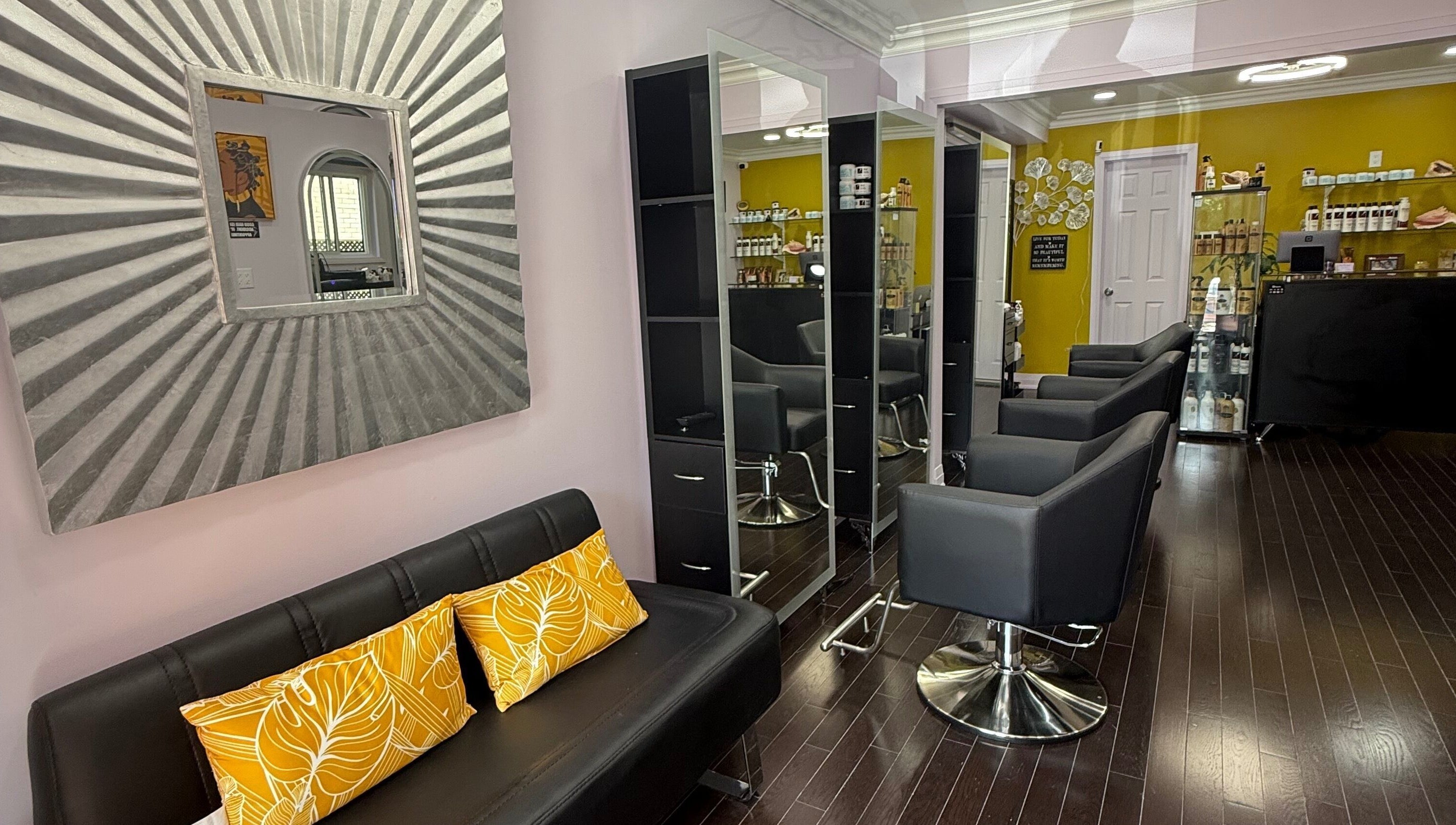 Elegant interior of My Butopia Salon, Ajax, Ontario, CA, featuring stylish chairs and decor.