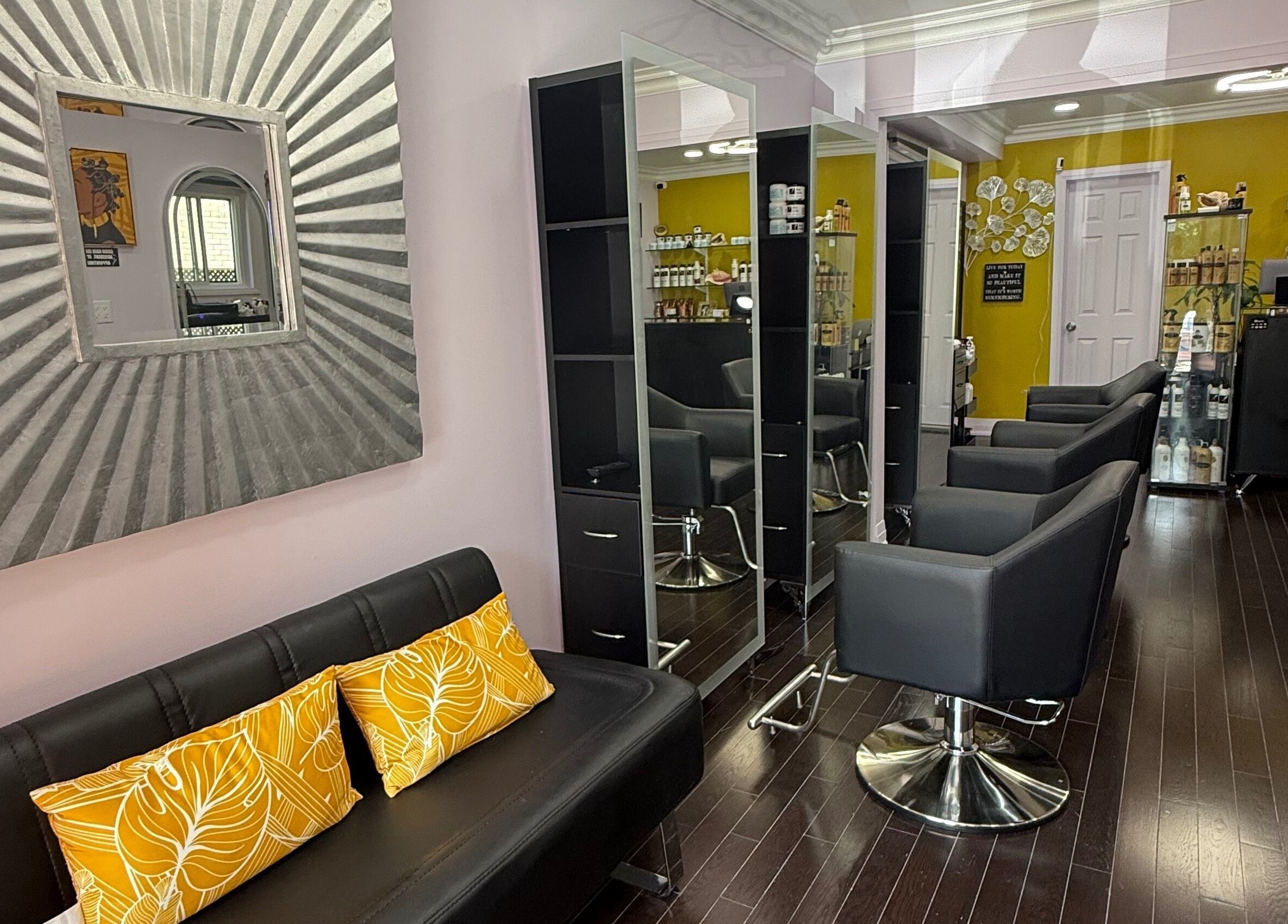 Elegant interior of My Butopia Salon, Ajax, Ontario, CA, featuring stylish chairs and decor.