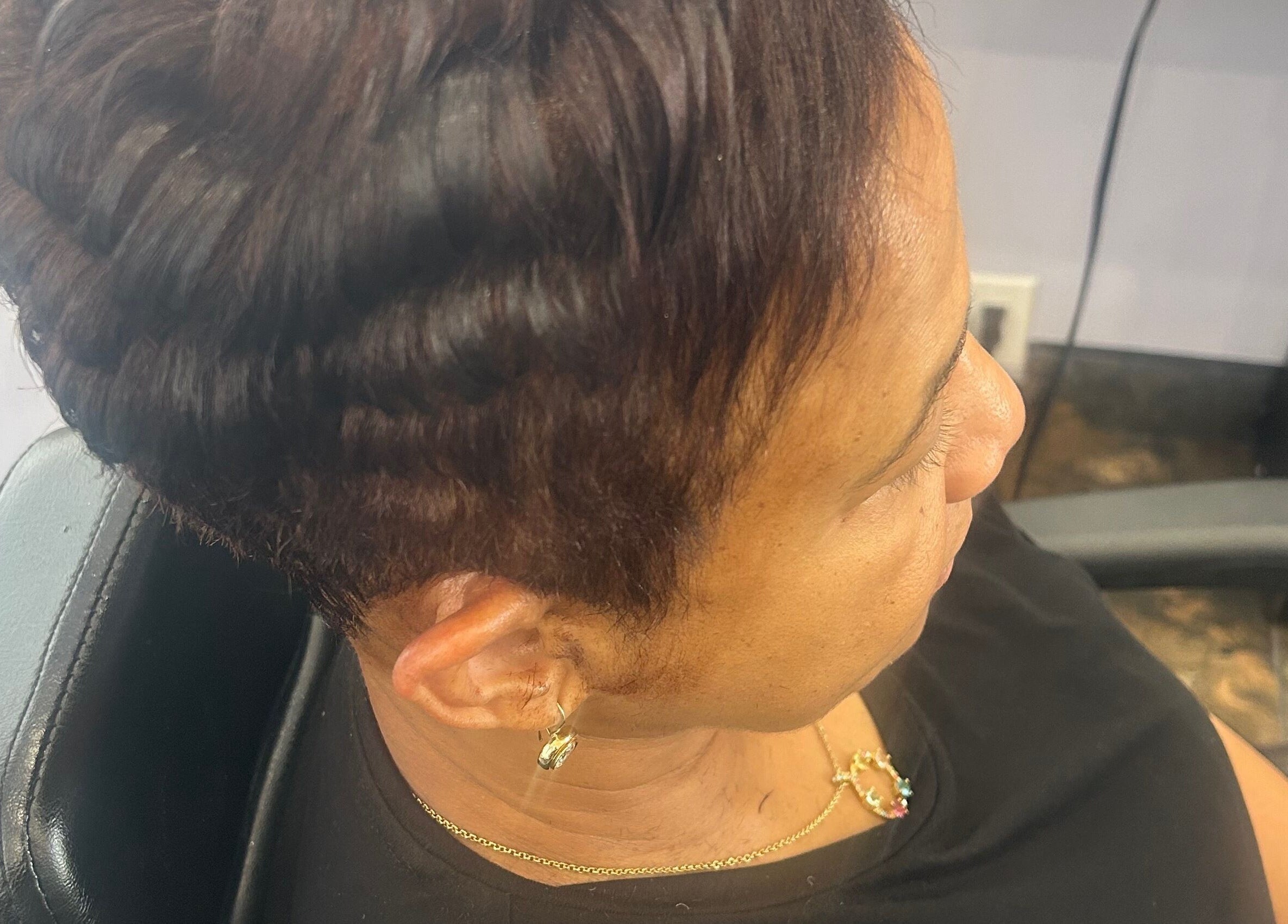 Close-up of a stylish short wavy haircut at My Butopia Salon in Ajax, Ontario, CA.