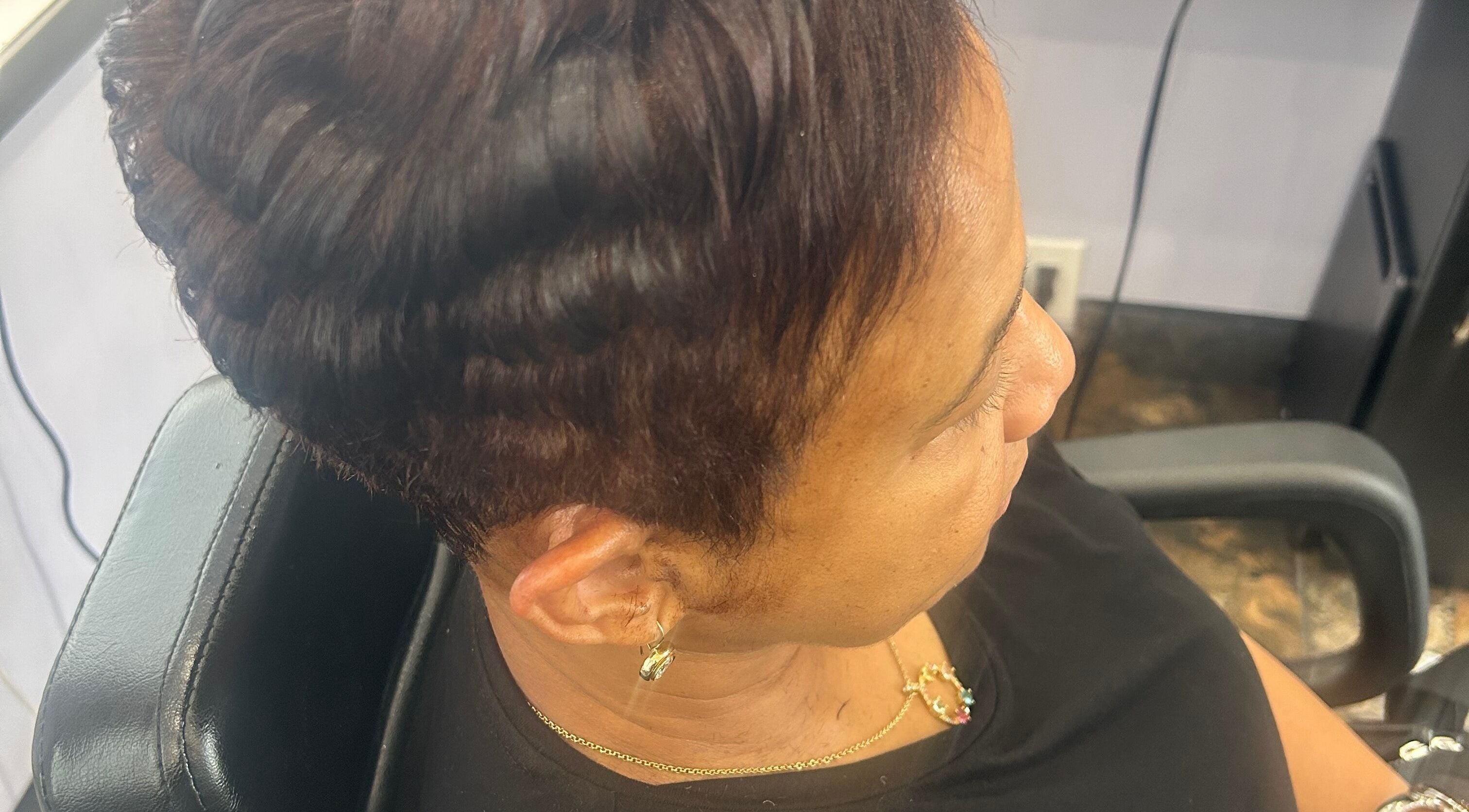 Close-up of a stylish short wavy haircut at My Butopia Salon in Ajax, Ontario, CA.