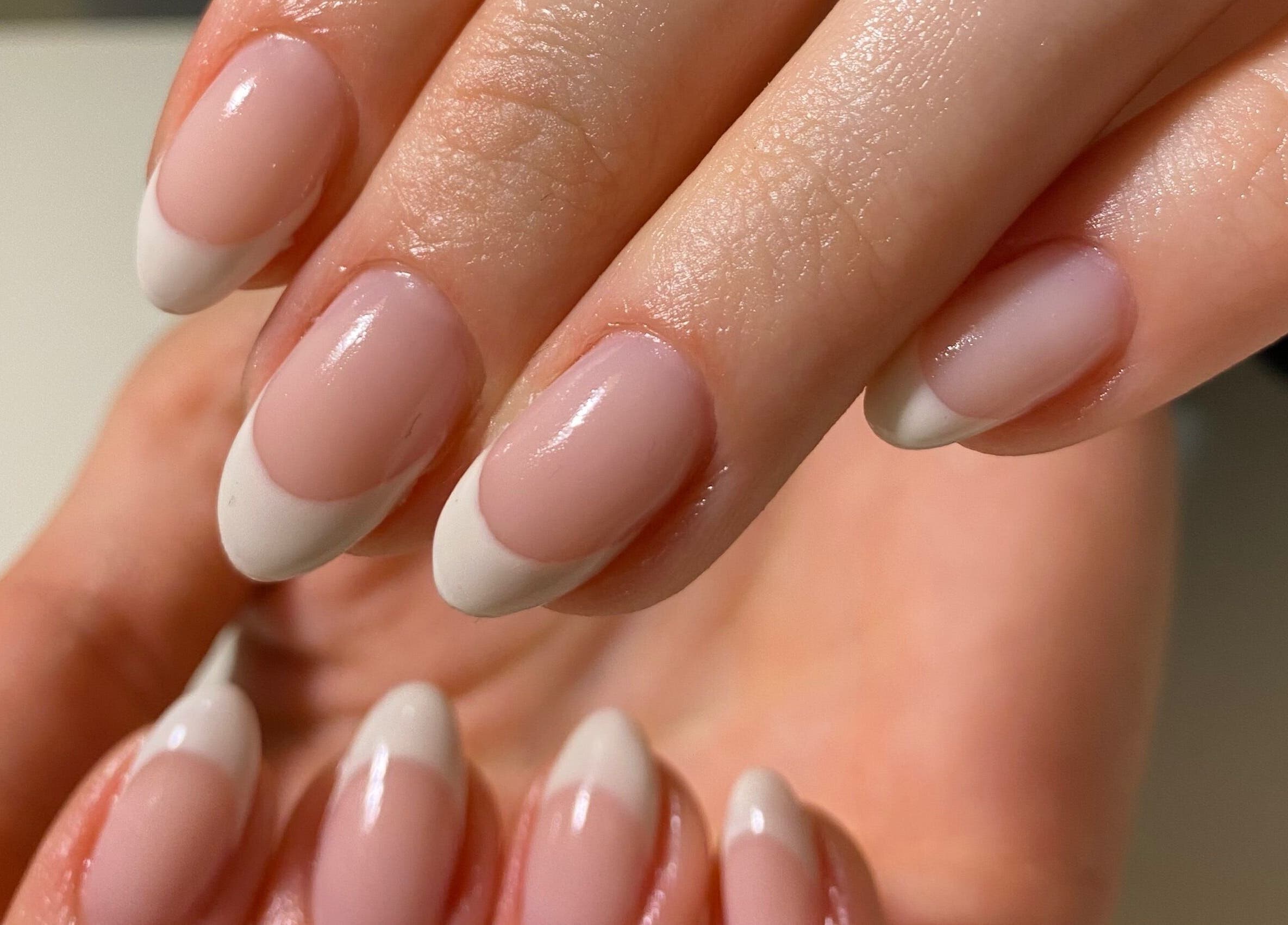 Elegant French manicure at Kana's Alter Ego Nail Studio, Ashmore, Queensland, AU.