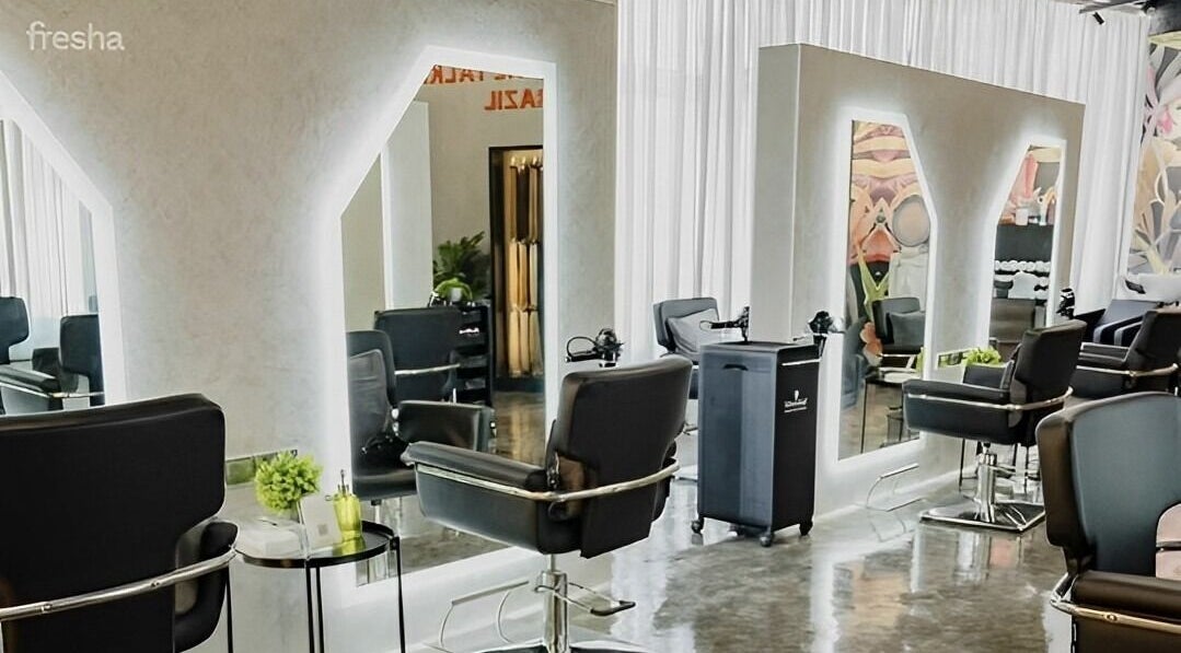 Sleek styling chairs and illuminated mirrors at Bella Brazil Salon - Seef, Manama, BH.