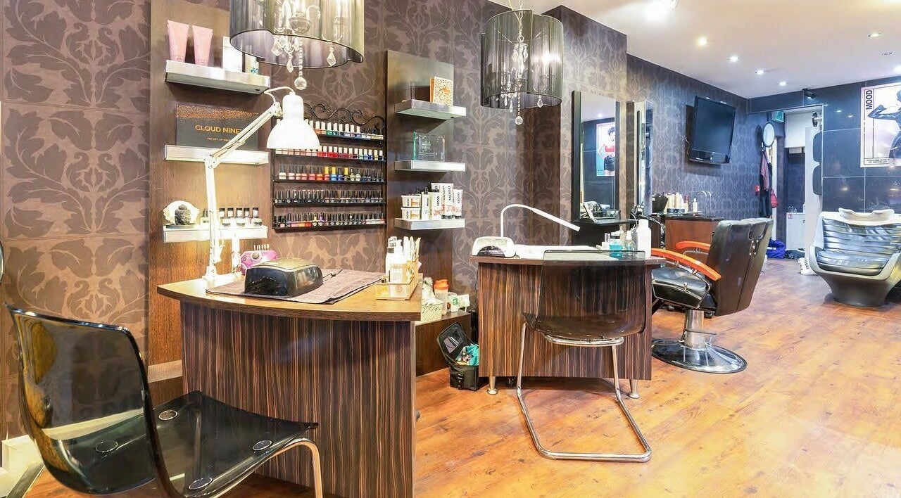 The Dalton Street Salon in Manchester, England, GB boasts chic decor with modern hair styling stations.