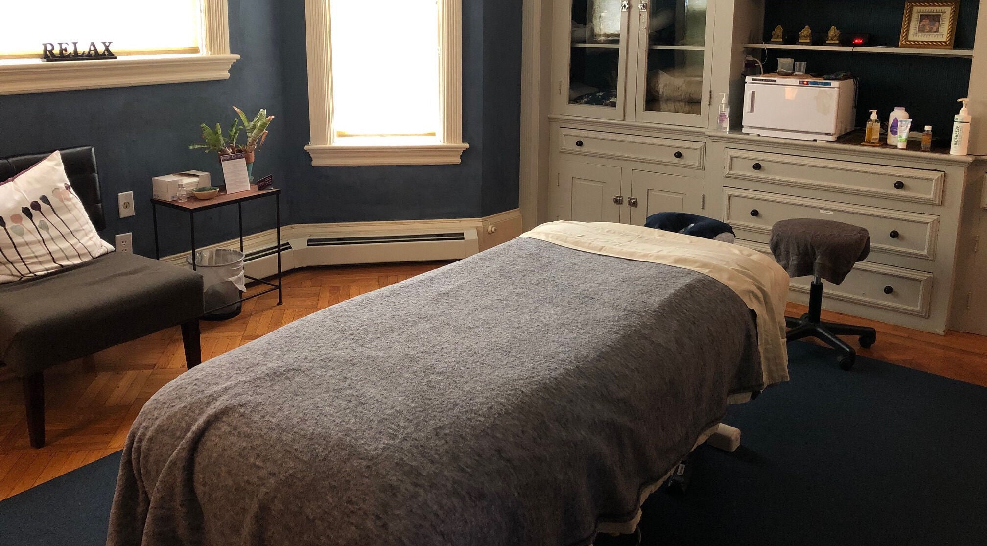Cozy massage room at Body Kneads™, Inc. (Providence) in Providence, Rhode Island, US showcasing a relaxing ambiance.