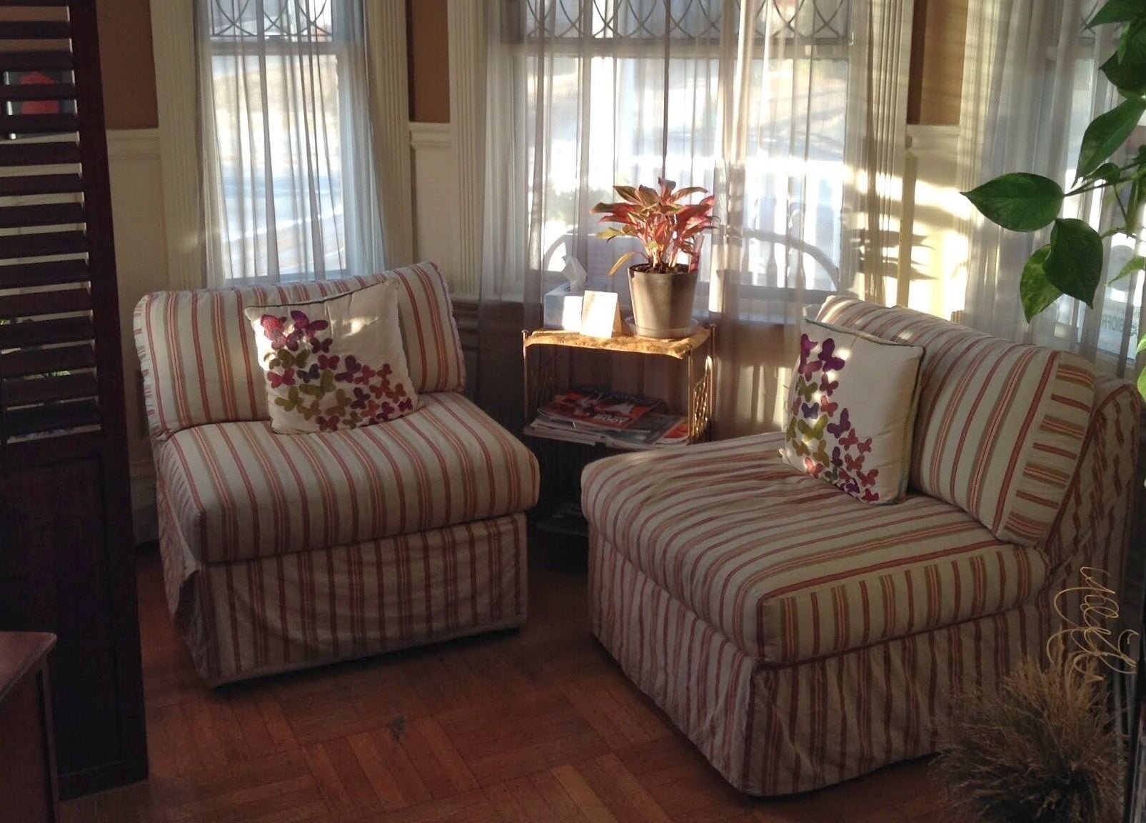 Inviting seating area at Body Kneads™, Inc. (Providence) in Providence, Rhode Island, US, exuding warmth and comfort.